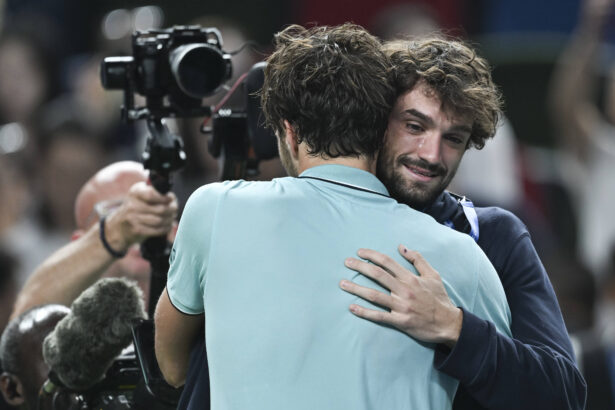 Arthur Rinderknech hugs Valentin Vacherot of Monaco after the men's singles semifinal between Arthur Rinderknech of France and Daniil Medvedev of Russia at the ATP World Tour Shanghai Masters tennis tournament in Shanghai, east China, Oct. 11, 2025. (Xinhua/Chen Haoming) - Chen Haoming -//CHINENOUVELLE_XxjpbeE000480_20251011_PEPFN0A001/Credit:CHINE NOUVELLE/SIPA/2510111806